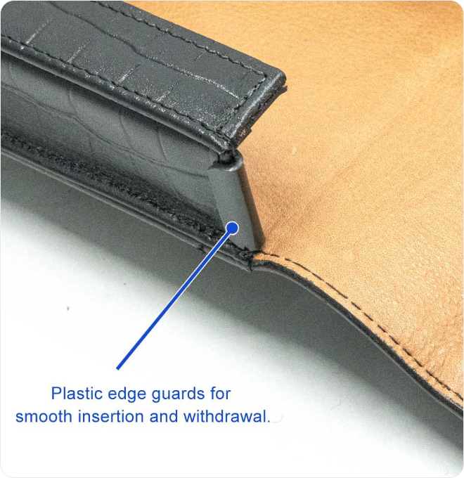 Black alligator-embossed holster, belt clip detail